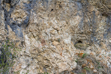 "A natural stone located on a mountain plateau, a natural phenomenon and the remnants of a volcanic eruption, close-up.