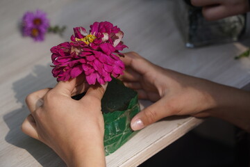 Florists teach children to collect flower arrangements