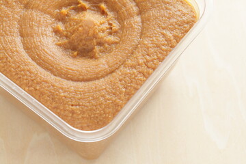 Japanese food ingredient, miso in plastic container for seasoning 