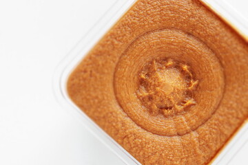 Japanese food ingredient, miso in plastic container for seasoning 