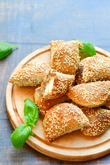 Fresh baked home made whole wheat  Gliten free  Mini cheese  puff pastries  .Cheese pie with phyllo pastry and herbs