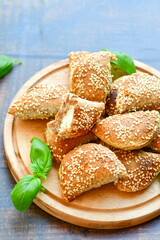 Fresh baked home made whole wheat  Gliten free  Mini cheese  puff pastries  .Cheese pie with phyllo pastry and herbs