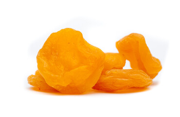 Dried apricots close up as a background. Heap of dried apricots on a white background.