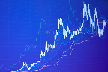 Rising stock market chart on blue background