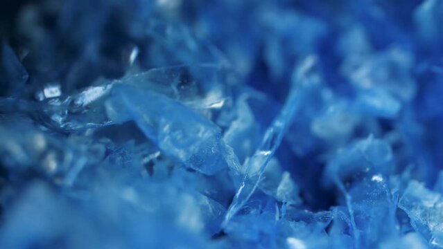 Macro shot of blue ocean microplastics closeup 