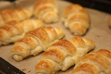 Close up photo of fresh butter croissants from oven