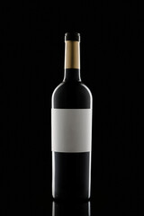 bottle silhouette blank label Bottle of red wine on a black background. Stylish alcohol