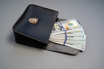 American dollar banknotes stack, pack of money in black bag, rich, luxury, currency, spending money in crisis, benchmark currency, most used in transactions across the world, corruption  