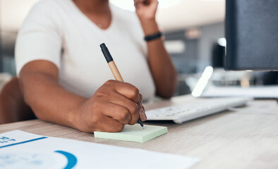 Receptionist, secretary or consultant with phone, writing client info on sticky note. Crm,...