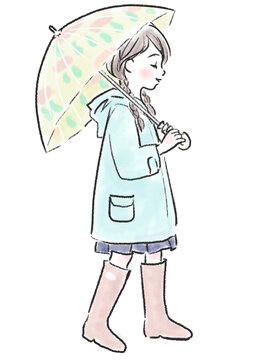 6月に傘をさして歩く女の子