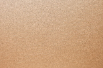 Abstract luxury gold-beige leather texture for background. Color leather for work design or backdrop product.