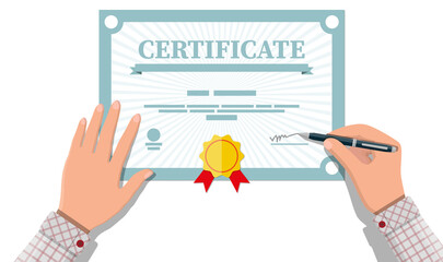 Businessman hand signs certificate