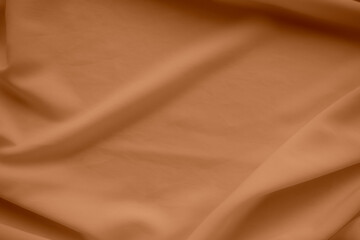 Orange Color Autumn Cloth Pattern Background,Silk Wave Texture Design Backdrop,Card Poster or Banner,Light Gradient Fabric Smooth Shape Colorful,Abstract Luxury Golden Template Wallpaper,free space.