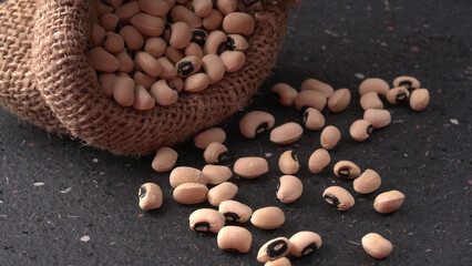 Uncooked black eyed peas. Health food concept.