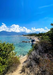 View from the path to the beautiful  Saleccia beach (Plage de Saleccia) near Saint Florent. Beach with crystal clear sea water, Corsica, France.