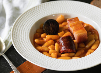 Succulent traditional dish of beans with chorizo and blood sausage