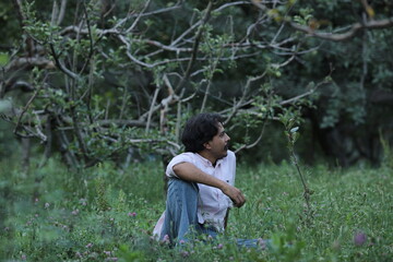 child playing in the woods