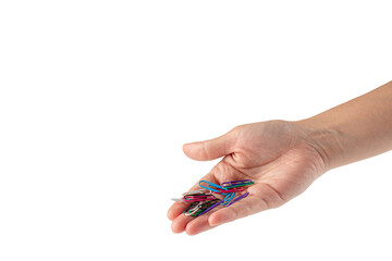 Hand and colorful paper clips isolated on white background