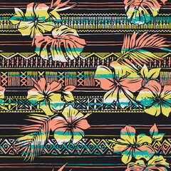 Hawaiian tribal elements and hibiscus flowers abstract grunge vintage vector seamless pattern © PrintingSociety