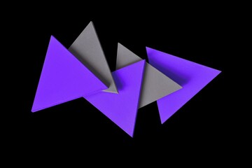 abstract shaped purple triangles solid pieces on black background.