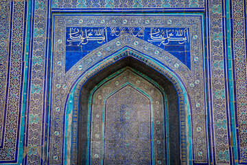 Fototapeta na wymiar Khiva, Uzbekistan - May 12, 2022: Traditional Oriental Design Details in the Ancient Uzbek Architecture