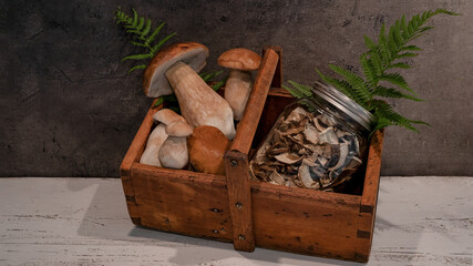 Food photography background - Fresh and dried forest mushrooms / Boletus edulis (king bolete) /...