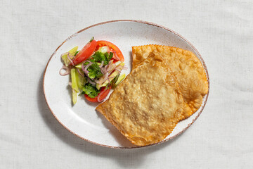Chebureki with salad