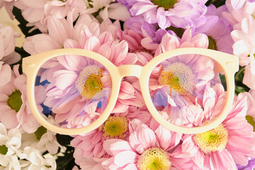 trendy plastic eye glasses and flowers, fashion eyewear conccept