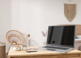 Laptop and smartphone on table at home. Distance education, courses, online training, learning concept. Work from home, working online. Shopping via internet. E-commerce. Modern interior. 3D render.