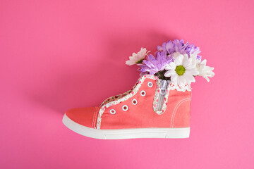 pink children's sneakers and chrysanthemums, flowers sneakers