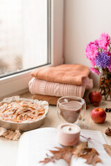 Homemade apple pie on a white background near the window close-up and copy space