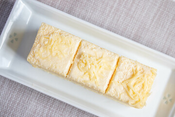 Vanilla cream cake in white plate