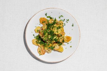 Fried potatoes with herbs
