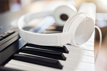Piano keyboard and headphones concept for music tuition, lessons and education - Powered by Adobe