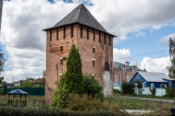 landscape with historical fragments of the brick red Kremlin of the city of Kolomna