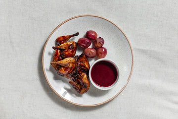Fried quail in cherry sauce