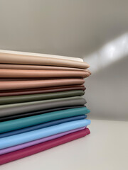 Skin fabrics in rolls, natural colors, fabric manufactory or shop for curtains and home textiles	
