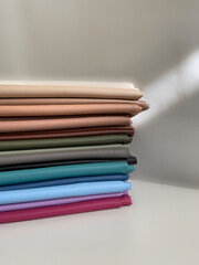 Skin fabrics in rolls, natural colors, fabric manufactory or shop for curtains and home textiles	