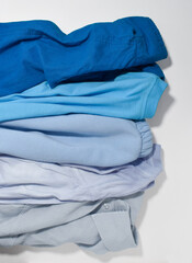 Collection of blue color clothes.