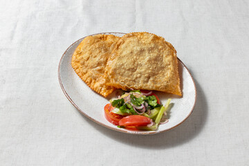 Chebureki with salad