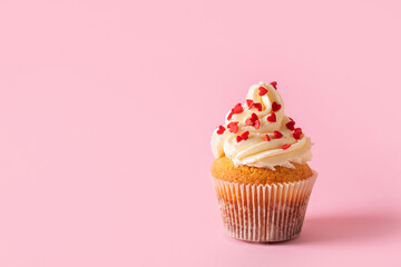 Vanilla cupcakes close up on with confectionery sprinkles