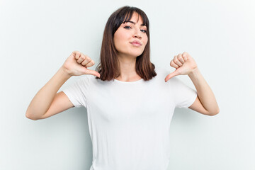 Fototapeta premium Young caucasian woman isolated on white background feels proud and self confident, example to follow.