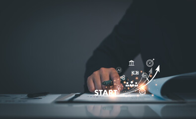 Startup business. Businessman starting an online company. Planning his business, trade, profits,...