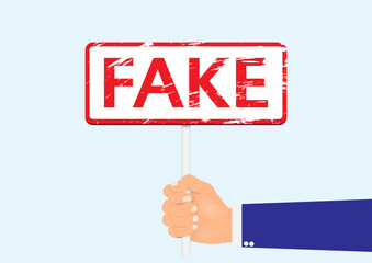 Hand holding signboard with text fake vector illustration