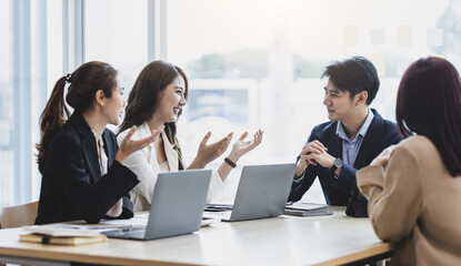 Fototapeta premium Business partnership meeting, Colleagues meeting to discuss project planning and market research for business profit growth. Collaboration of people in the organization.