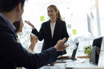 Business partnership meeting, Colleagues meeting to discuss project planning and market research for business profit growth. Collaboration of people in the organization.