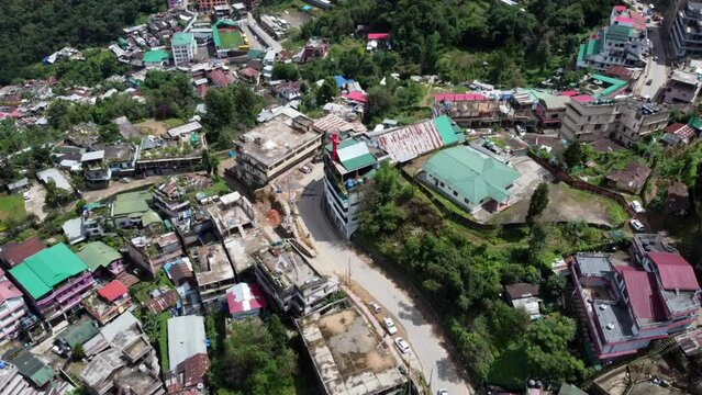 An incredible aerial view of the roads and houses and a church in the hill city of Kohima in Nagaland, India.