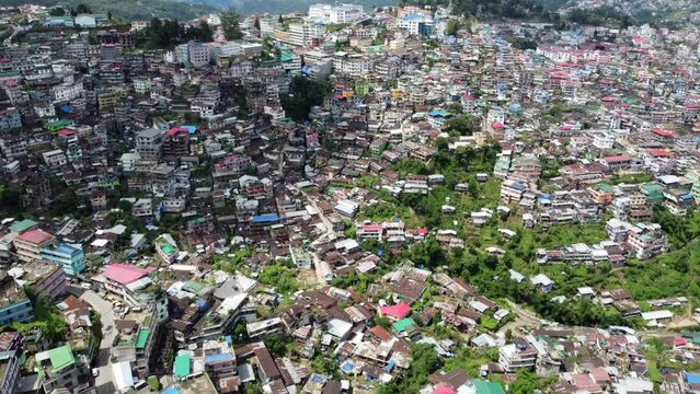 An incredible aerial flight over the heavily populated hill city of Kohima in Nagaland northeast India.
