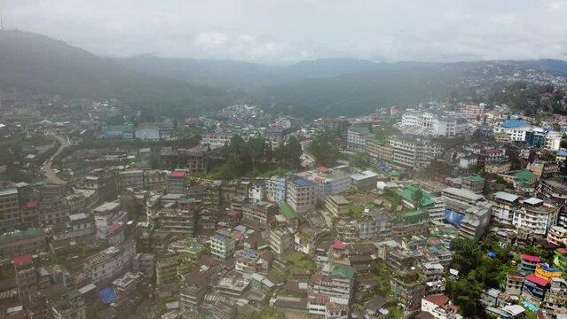 An aerial flight on a foggy day over the hill city of Kohima in Nagaland northeast India.