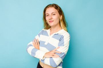 Fototapeta premium Young caucasian woman isolated on blue background happy, smiling and cheerful.